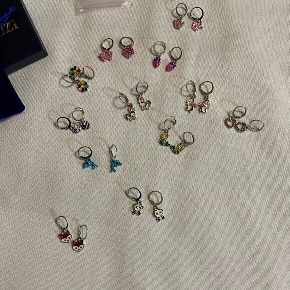 12 pairs earrings for little girls.  See dimes for size reference.  NEW - Picture 1 of 7